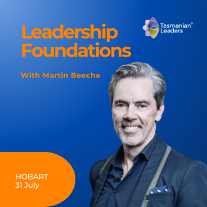 Promotional tile for Leadership foundations. Blue background with orange text. Includes head and shoulders photo of Martin Beech smiling at camera in blue shirt and jacket with neat grey hair and cropped beard.